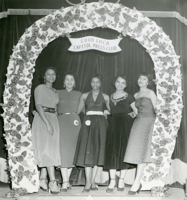 Ethel Payne, at center, photographed with other female  members of the Capital Press Club early in her career. 