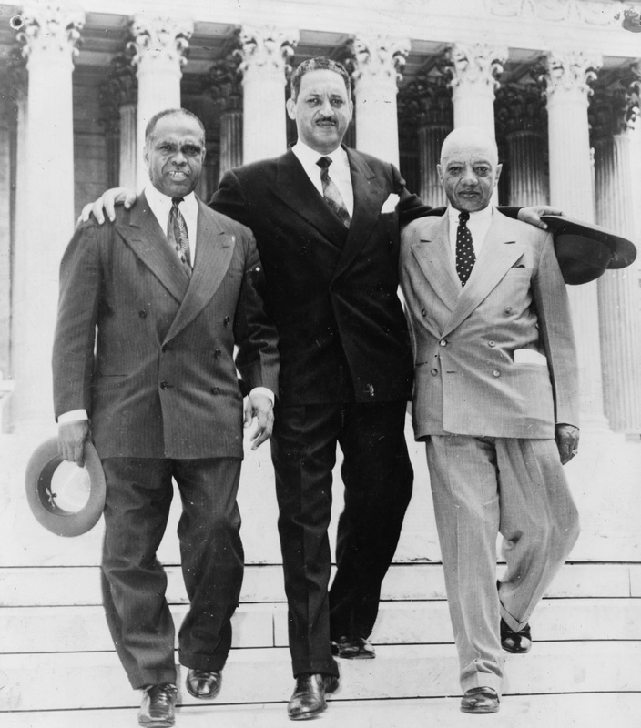 James Nabrit (right) descends the steps of the US Supreme Court following the team's victory in Brown v. Board of Education and Bolling v. Sharpe, May 1954.